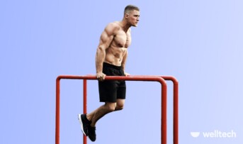 a man is doing chest dips on a dip bar_what muscles do dips work
