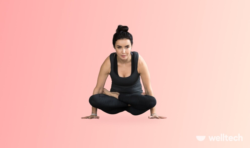 a woman is doing Scale Pose_yoga arm balances