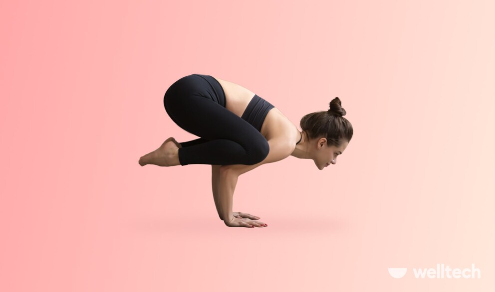 a woman is performing Crow Pose_yoga arm balances