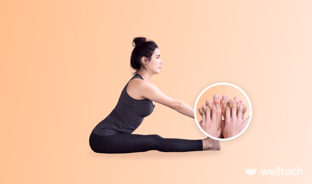 a woman is massaging her feet putting Fingers Between Toes_feet yoga, yoga toe exercises