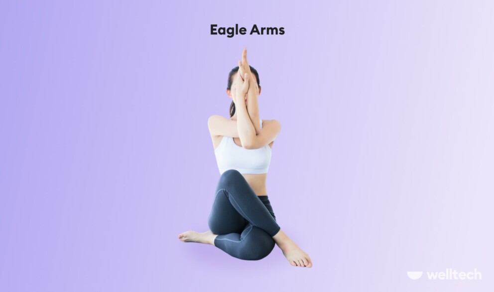 a woman is practicing Eagle Arms_Garudasana Variation_shoulder yoga poses