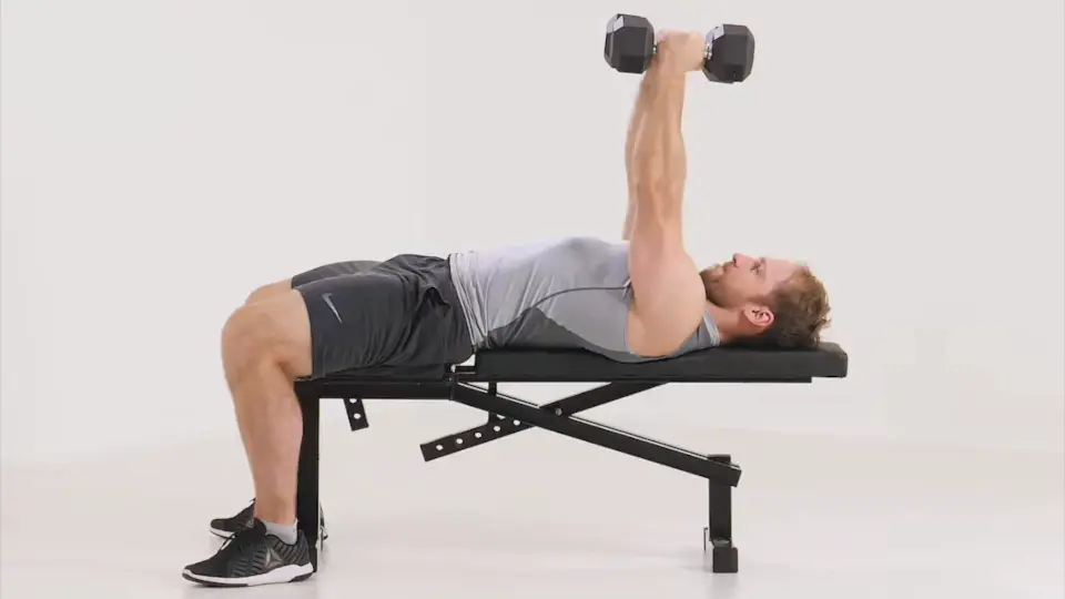 a man is performing Dumbbell Chest Fly_dumbbell push workouts