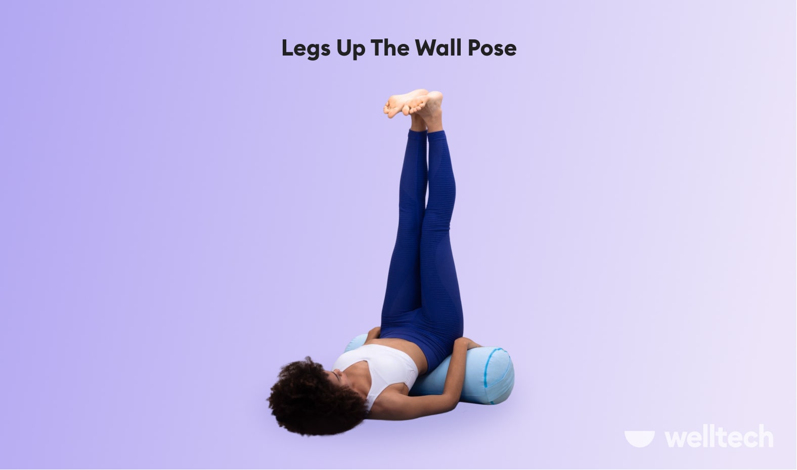 a woman is practicing restorative yoga_legs up the wall pose_yoga poses with a bolster