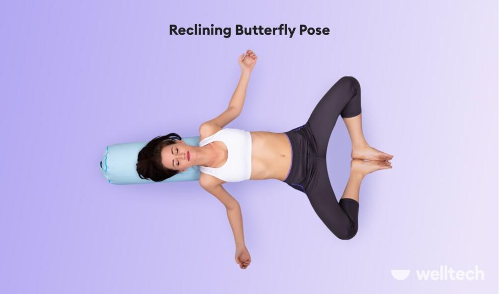 a woman is practicing restorative yoga_reclining butterfly pose_yoga poses with a bolster