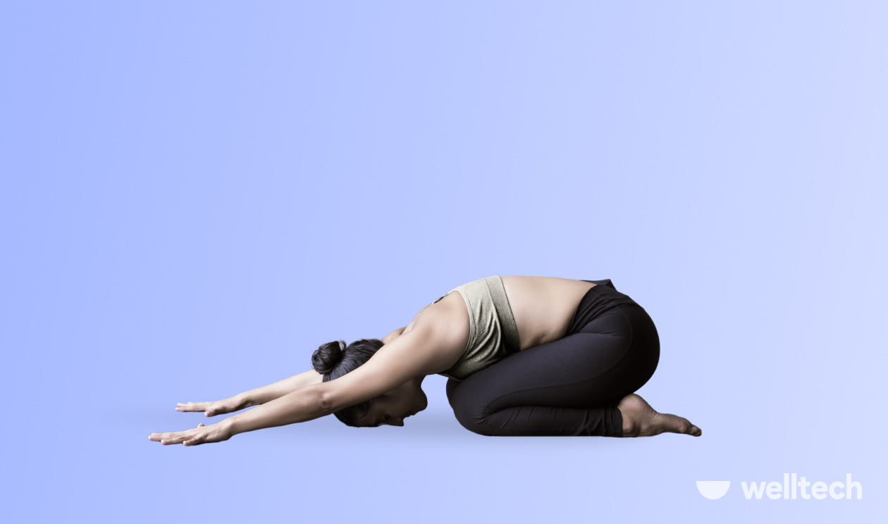 a woman is practicing yoga, doing Child’s Pose (Balasana)_yoga inversions
