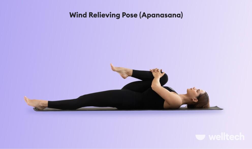 a woman is practicing Wind Relieving Pose (Apanasana)_yoga with hernia