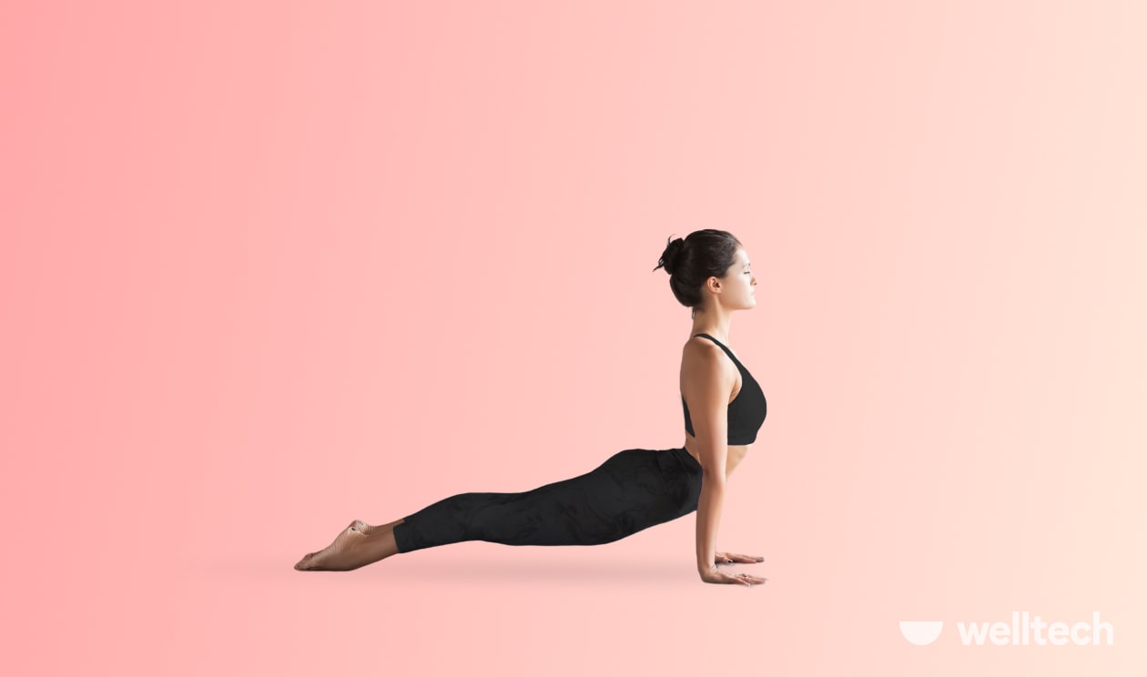a woman is performing Upward Facing Dog Pose (Urdhva Mukha Svanasana)__core yoga poses
