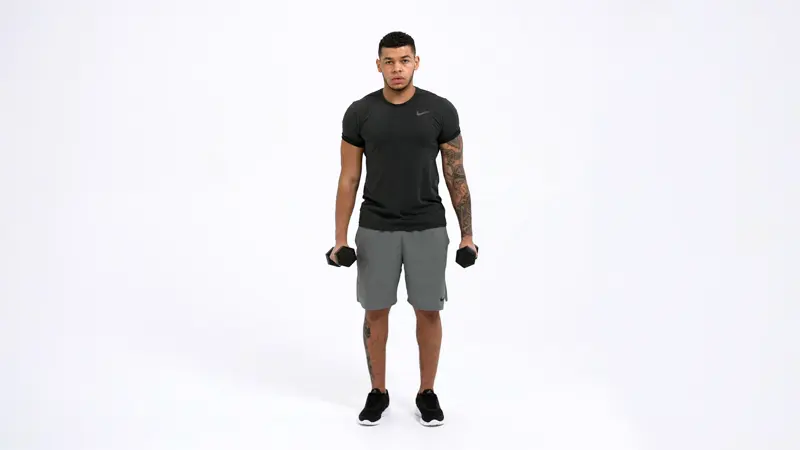 a man is performing Dumbbell Standing Inner Bicep Curl, short head bicep exercises
