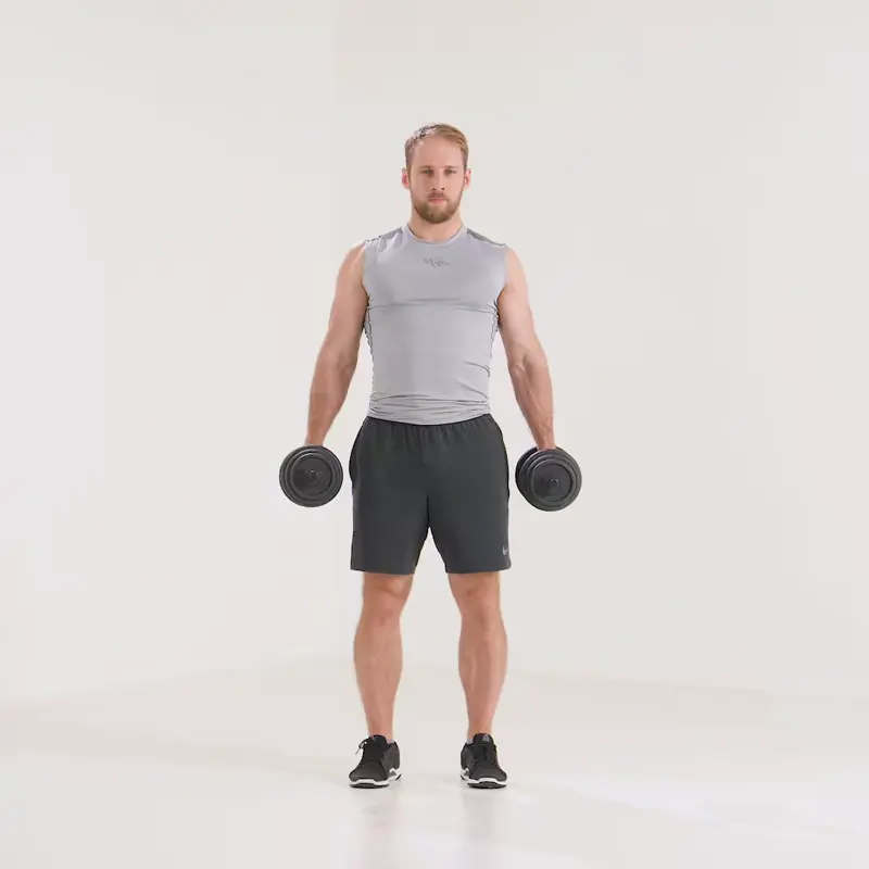 a man is performing dumbbell bicep curl standing_short head bicep exercises