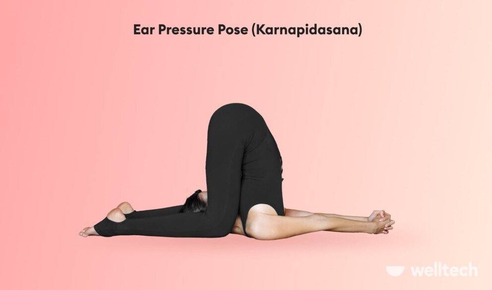 a woman is practicing Ear Pressure Pose (Karnapidasana)_crazy yoga poses