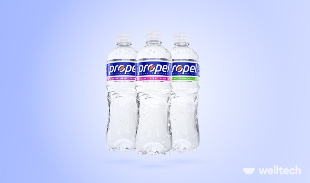 tree bottles of propel water on purple background, is propel water good for you