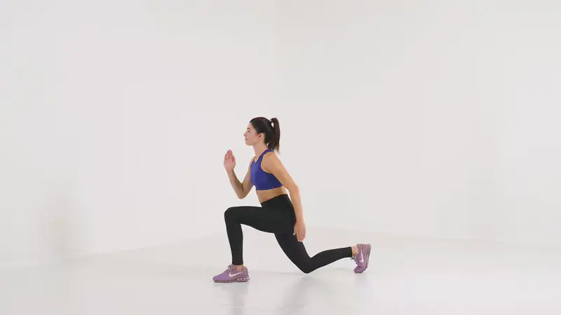 a woman is doing plyometrics, Jumping Lunges_plyometric exercises for speed