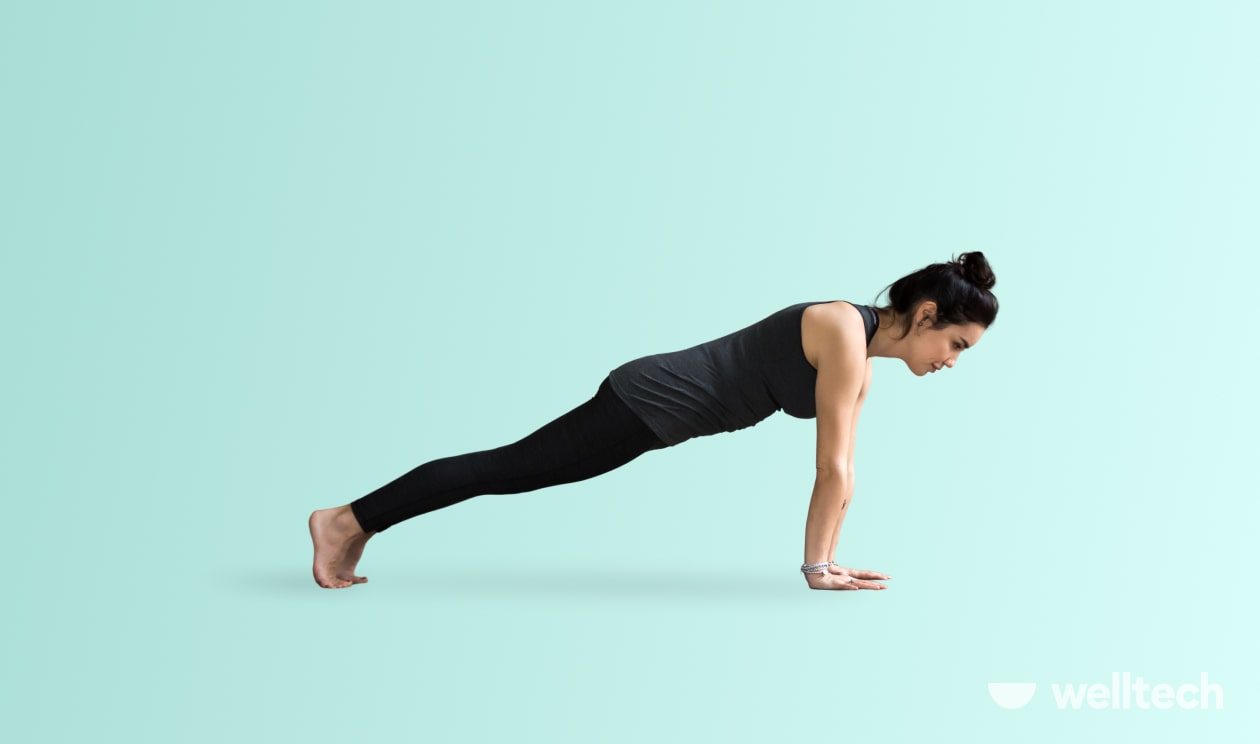 a woman is practicing yoga, doing Plank Pose (Phalakasana)_yoga for belly fat