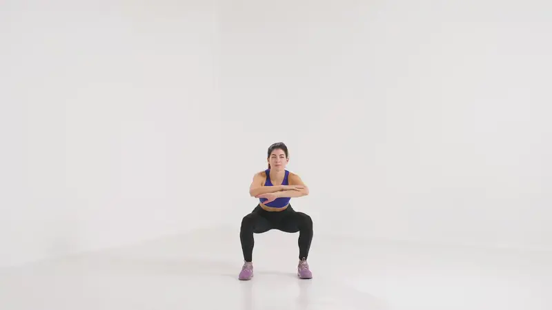 a woman is doing plyometrics, Squat Jumps_plyometric exercises for speed