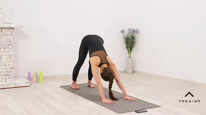 a woman is practicing yoga, doing childs pose_yoga warm up