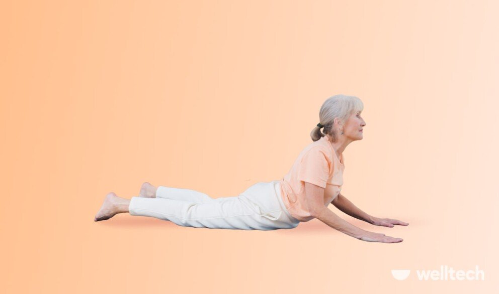 a senior woman is practicing yoga, doing cobra pose_Beginning Yoga For Seniors