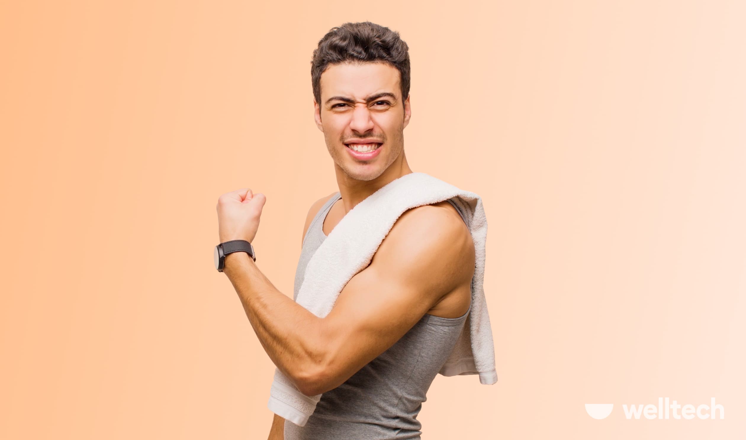 a man is flexing his bicep, smiling, looking at the camera, does flexing build muscle