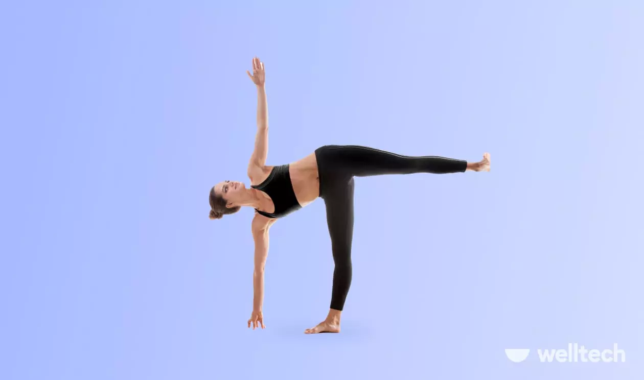 a woman is doing yoga, practicing Half Moon Pose (Ardha Chandrasana)_standing yoga poses