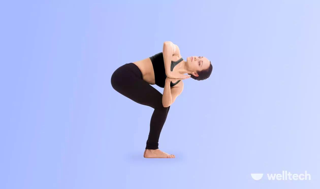 a woman is doing yoga, practicing Revolved Chair Pose (Parivrtta Utkatasana)_standing yoga poses