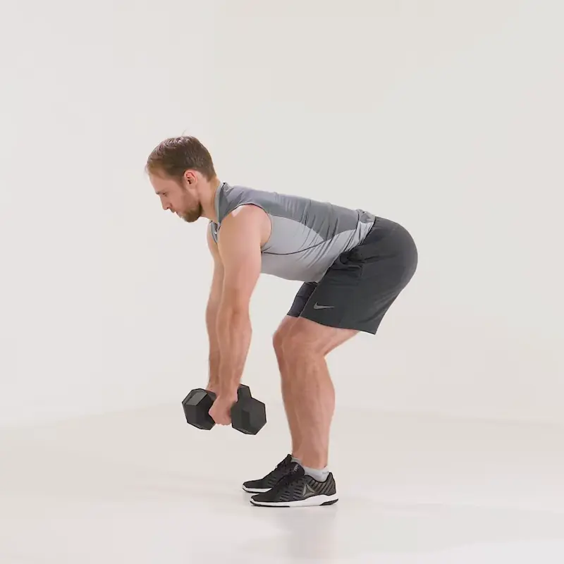 a man is performing dumbbell rows_beginner dumbbell exercises