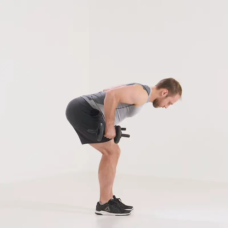 a man is performing triceps kickback_beginner dumbbell exercises