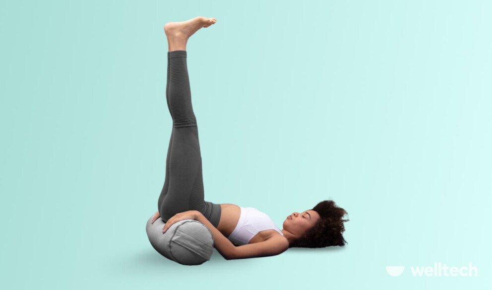 a woman is practicing yoga, doing Legs Up the Wall Pose (Viparita Karani)_yoga poses relaxing