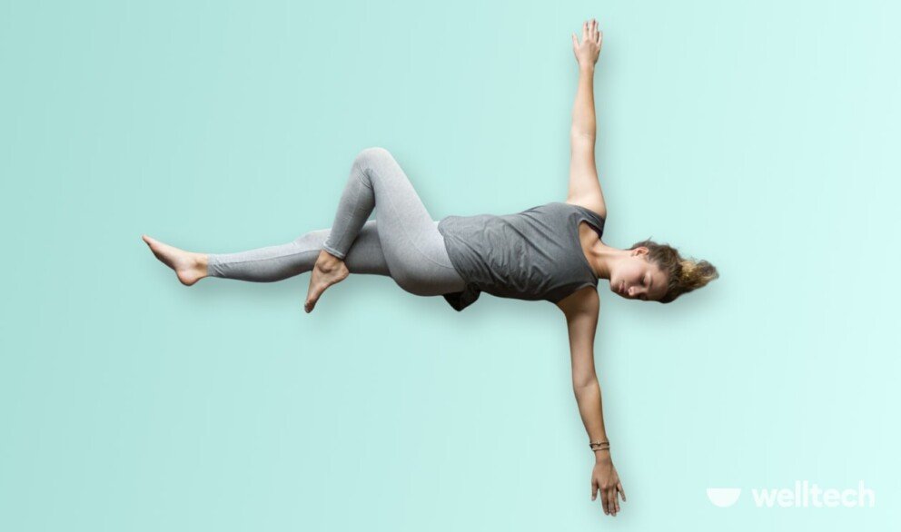 a woman is practicing yoga, doing Supine Spinal Twist (Supta Matsyendrasana)_yoga poses relaxing