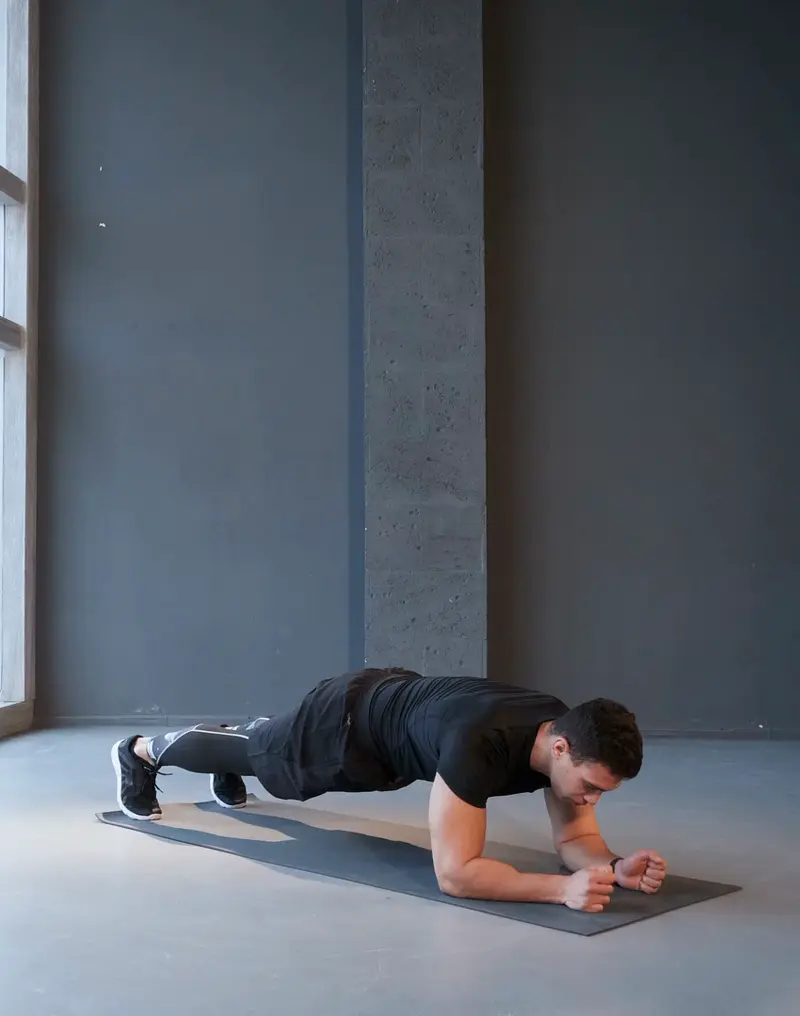 a man is working out, doing Front Plank, Calisthenics for Beginners