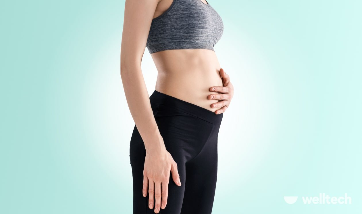 a woman with bloated stomach, bloating while fasting