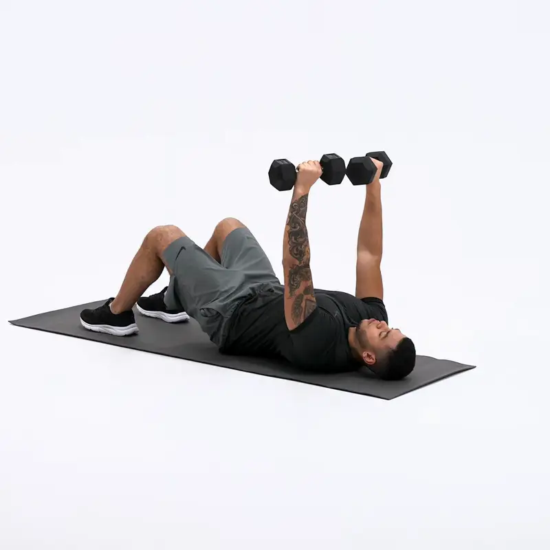a man is working out, doing Floor Dumbbell Press_how to lose upper body fat