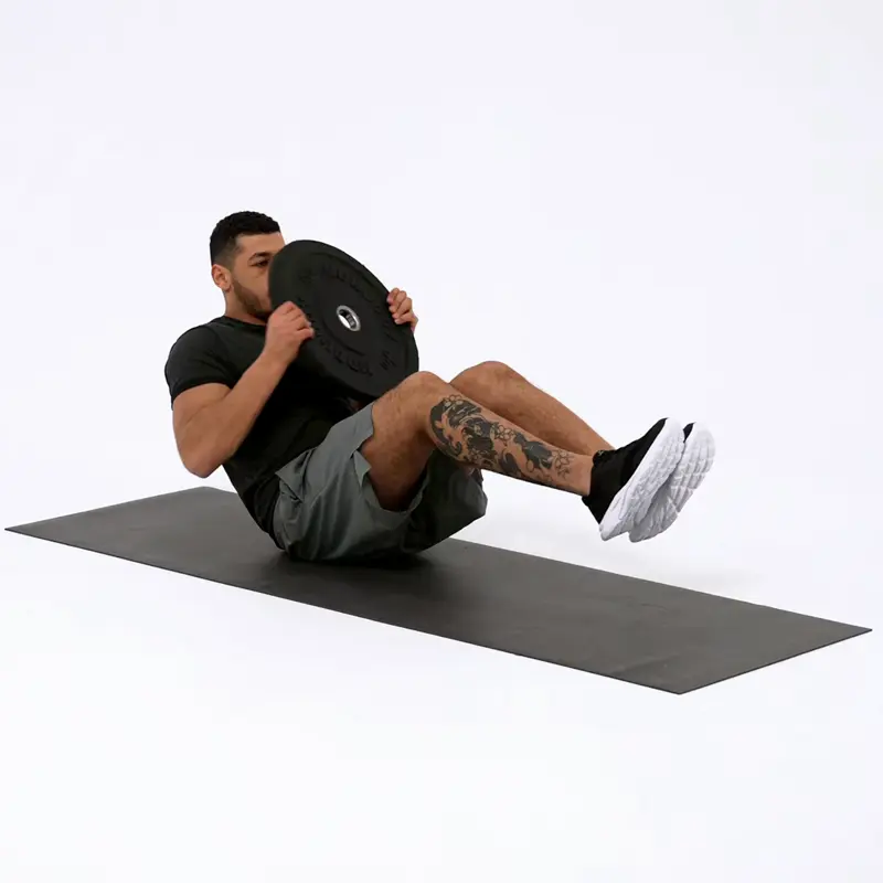 a man is working out, doing Plate Russian Twist_how to lose upper body fat